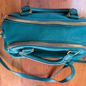 Chic Teal Crossbody Bag with Gold Accents